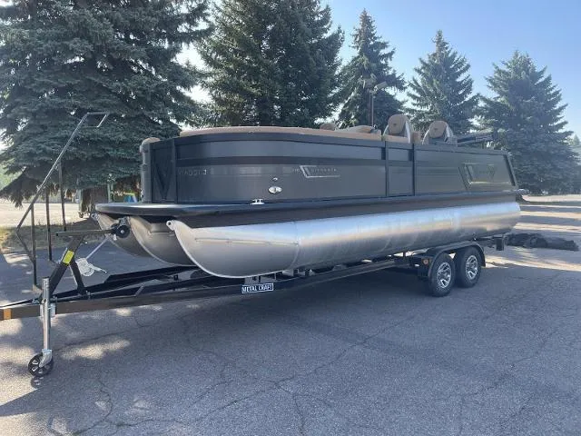Slide: The Image of 2022 Viaggio D23Q pontoon boat on a trailer, parked outdoors. - 5