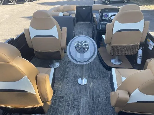 Slide: The Image of Interior of a 2022 Viaggio D23Q boat with tan and white seating. - 7
