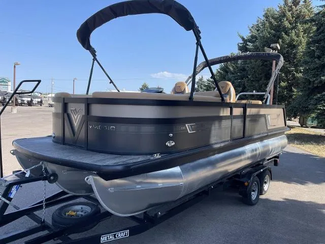 Slide: The Image of 2022 Viaggio D23S pontoon boat on a trailer in a parking lot. - 3
