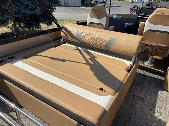 Slide: The Image of 2022 Viaggio D23S boat with tan and white seating. - 8