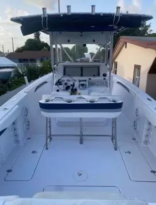 Slide: The Image of 2012 Donzi 32 ZF Open boat interior with helm and seating. - 11