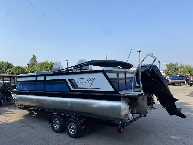 Slide: The Image of 2022 Viaggio D23Q pontoon boat on a trailer in a parking lot. - 3