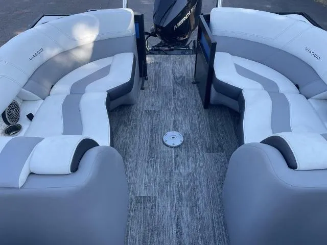 Slide: The Image of Viaggio D23U 2022 model boat interior with gray and white seating. - 10