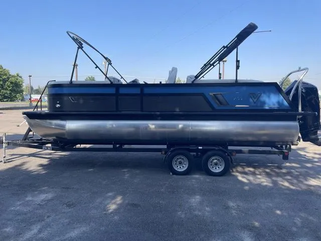 Slide: The Image of 2022 Viaggio D23U pontoon boat on a trailer in a parking lot. - 3