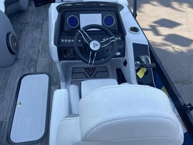 Slide: The Image of Viaggio D23U 2022 boat cockpit with steering wheel and control panel. - 9