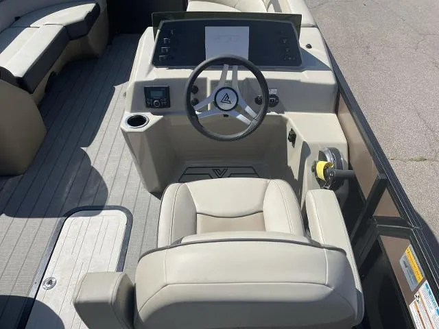 Slide: The Image of 2022 Viaggio L22S boat cockpit with steering wheel and seating. - 10