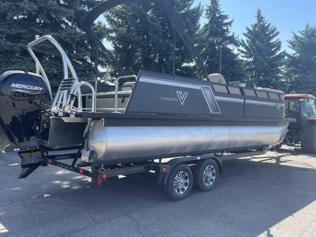 Slide: The Image of 2022 Viaggio L22S pontoon boat on trailer with Mercury outboard motor. - 2