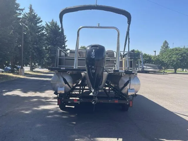 Slide: The Image of 2022 Viaggio L22S pontoon boat with 150 HP engine on trailer. - 4