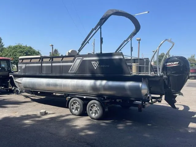 Slide: The Image of 2022 Viaggio L22S pontoon boat on trailer with Mercury outboard motor. - 6
