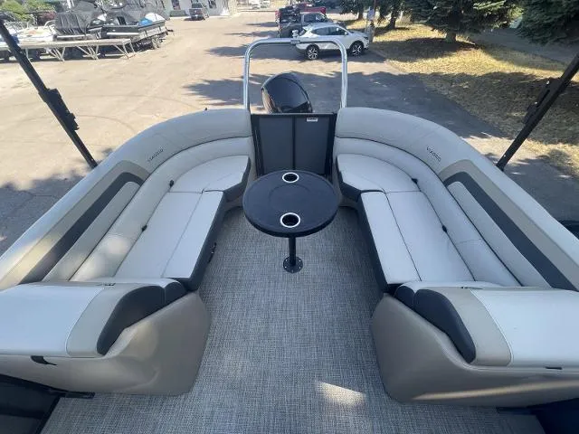 Slide: The Image of 2022 Viaggio L22U pontoon boat with spacious seating and central table. - 11