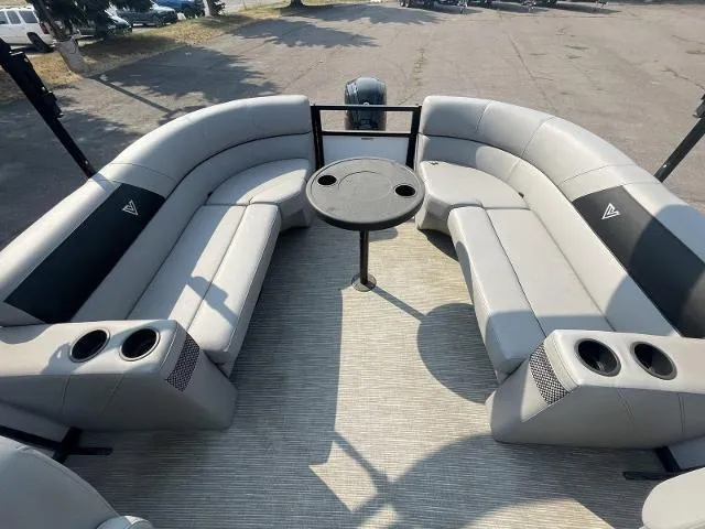 Slide: The Image of 2022 Viaggio DM20U boat interior with gray seating and round table. - 10