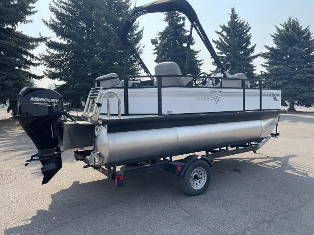 Slide: The Image of 2022 Viaggio DM16F pontoon boat on trailer with Mercury outboard motor. - 6