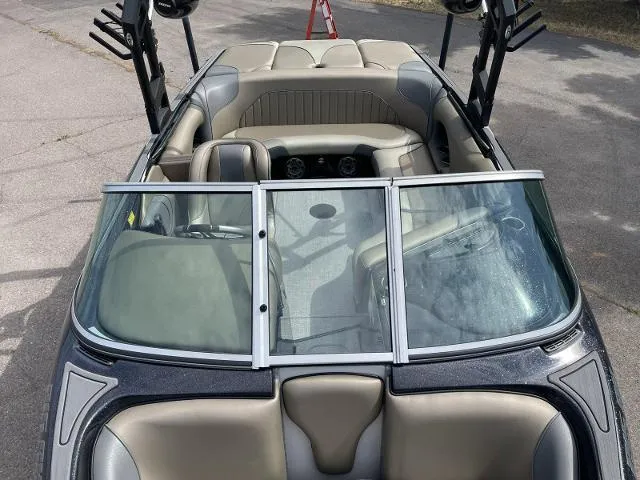 Slide: The Image of 2023 Sanger V-215 SX boat interior with seating and windshield. - 10