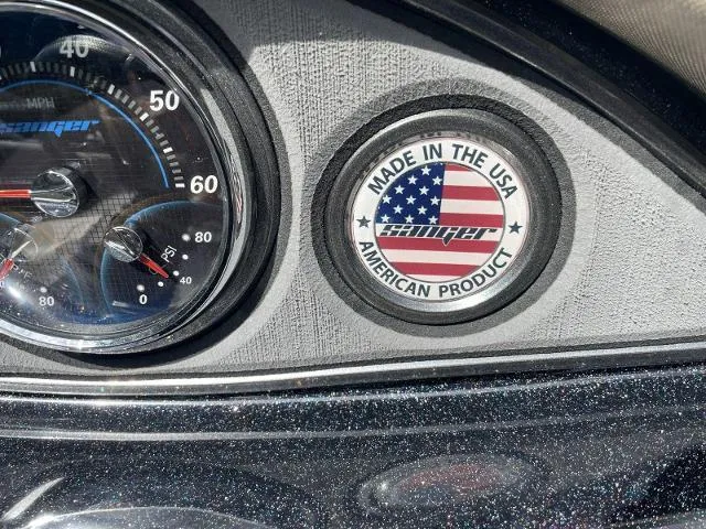 Slide: The Image of 2023 Sanger V-215 SX dashboard with Made in the USA emblem. - 8