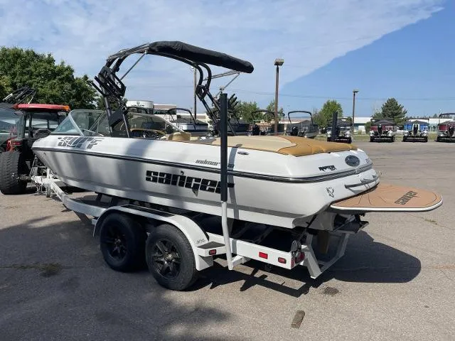 Slide: The Image of 2023 Sanger V215 Special boat on a trailer in a parking lot. - 4