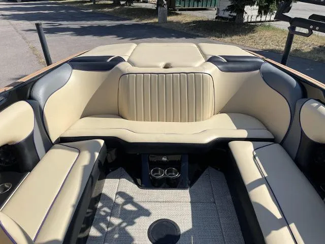 Slide: The Image of 2023 Sanger V215 Special boat interior with beige and black seating. - 8