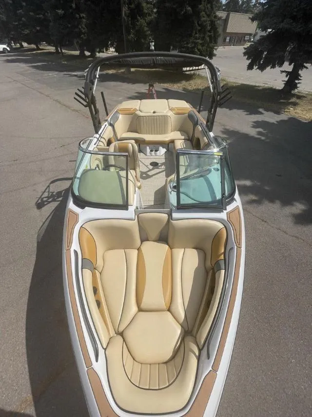 Slide: The Image of 2023 Sanger V237 SX boat with tan and beige interior. - 10