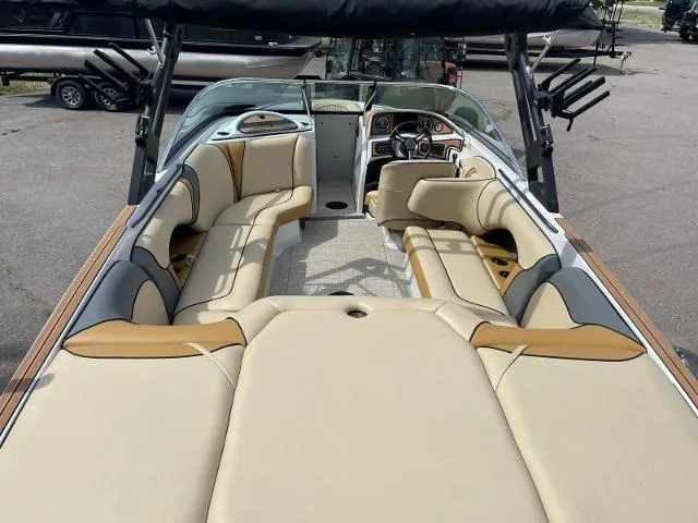 Slide: The Image of 2023 Sanger V237 SX boat interior with beige and tan seating. - 7
