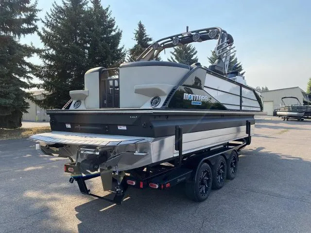 Slide: The Image of 2023 Montara Surf Boss 202 boat on a trailer, rear view. - 4