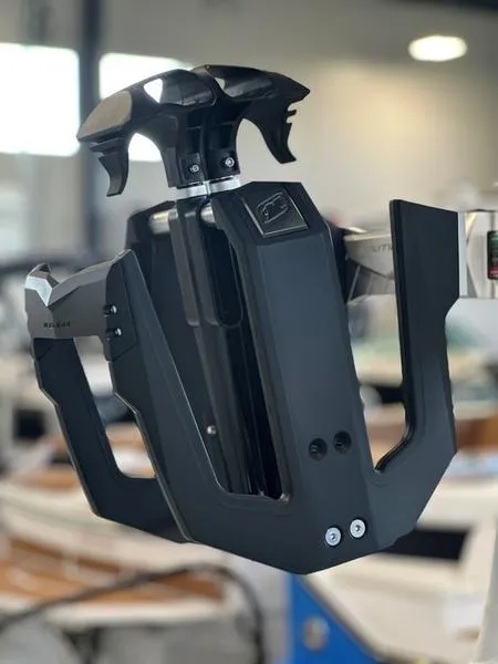 Slide: The Image of 2024 Nautique GS24 boat wakeboard tower in a showroom. - 2