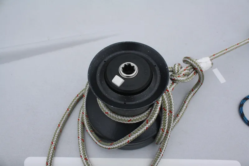 Slide: The Image of Sailing winch with rope on a 2004 Farr 40 yacht deck. - 16