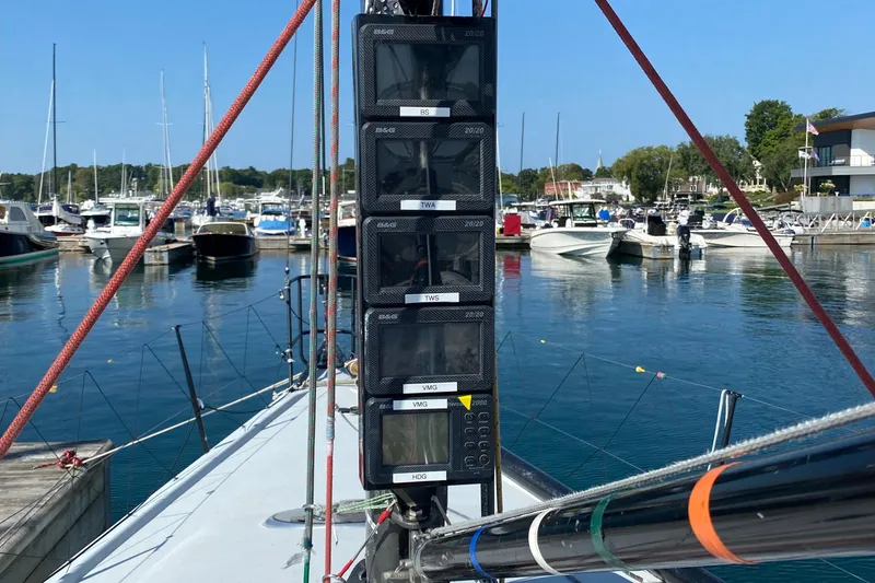 Slide: The Image of Farr 40 sailboat cockpit with navigation instruments, docked in a marina, 2004 model. - 20