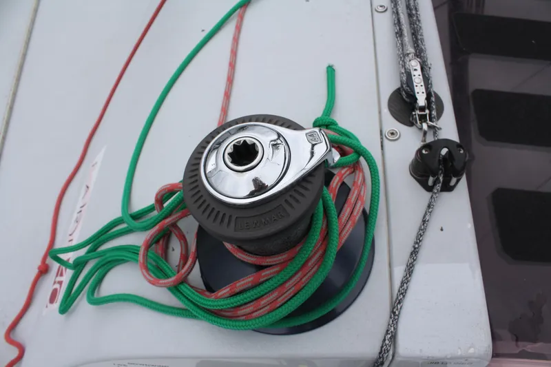 Slide: The Image of Winch with colorful ropes on 2004 Farr 40 sailboat deck. - 21