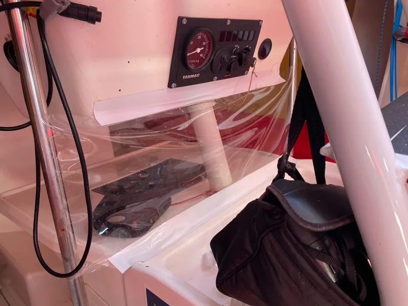 Slide: The Image of Control panel of a 2004 Farr 40 sailboat with navigation equipment. - 28