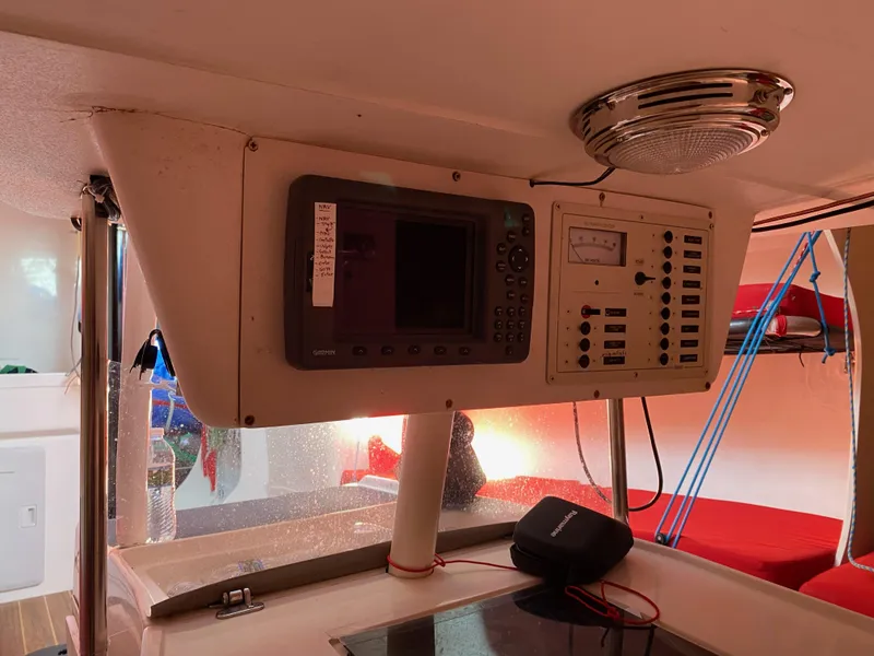Slide: The Image of Interior of 2004 Farr 40 sailboat with navigation equipment and control panel. - 34
