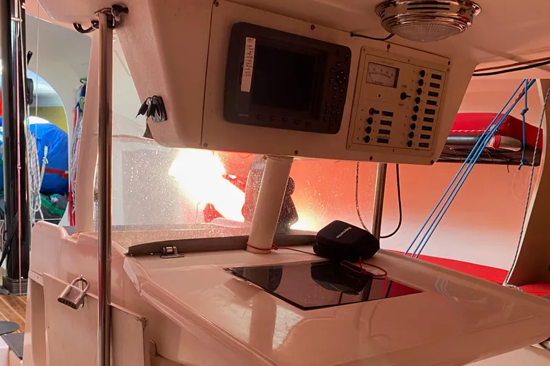 Slide: The Image of Interior of a 2004 Farr 40 sailboat with navigation equipment and modern controls. - 35