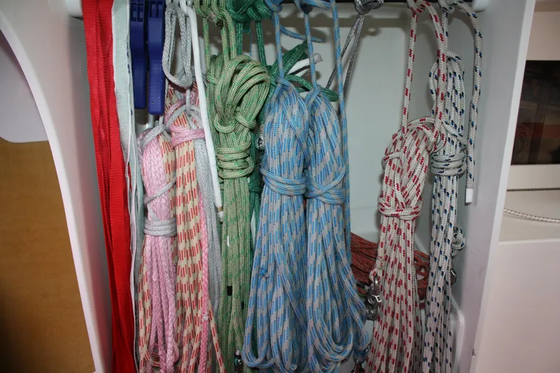 Slide: The Image of Colorful ropes hanging in a Farr 40 sailboat, 2004 model. - 44