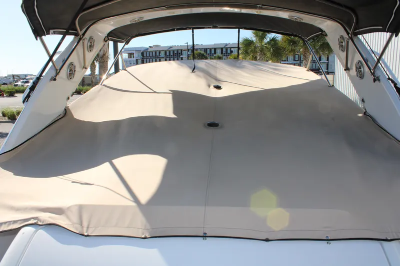 Slide: The Image of 1999 Formula 400 Super Sport boat with covered deck and canopy. - 11