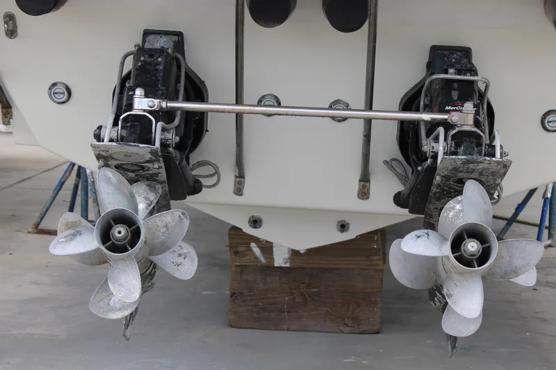 Slide: The Image of 1999 Formula 400 Super Sport boat propellers and stern drive. - 12