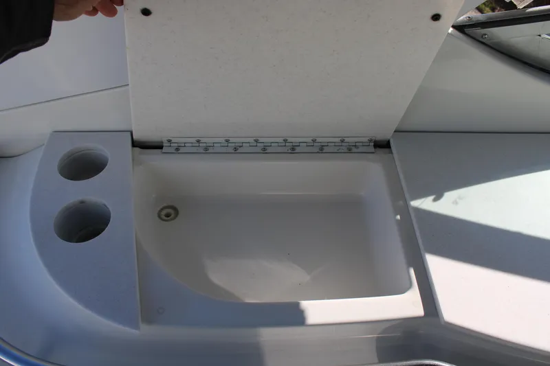 Slide: The Image of Open storage compartment on a 1999 Formula 400 Super Sport boat. - 24