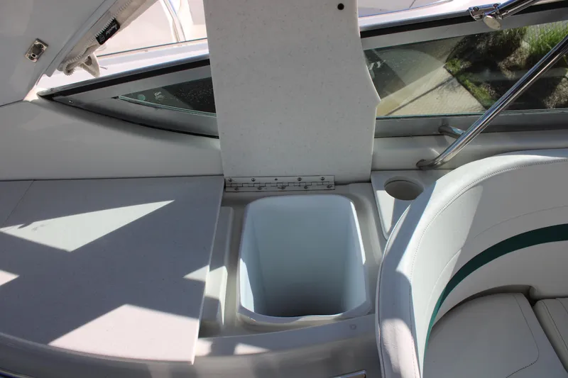 Slide: The Image of Interior of a 1999 Formula 400 Super Sport boat with storage compartment. - 26