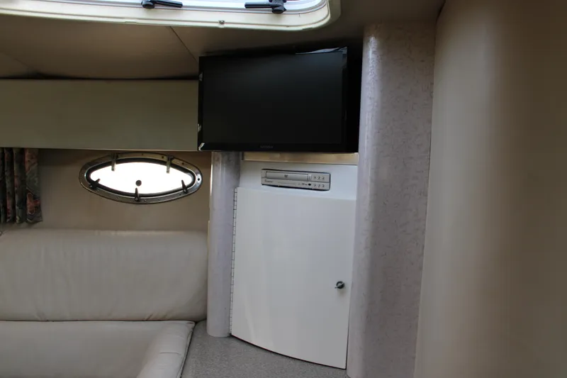 Slide: The Image of Interior of a 1999 Formula 400 Super Sport with TV and seating area. - 44