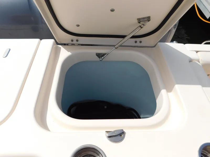Slide: The Image of Open storage compartment on 2018 Grady-White Freedom 375 boat. - 14