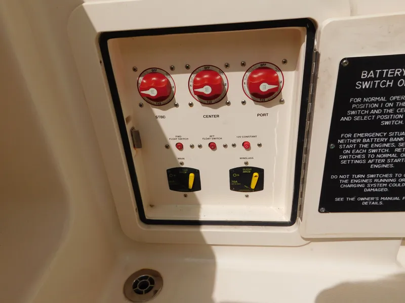 Slide: The Image of Control panel of a 2018 Grady-White Freedom 375 boat with battery switches. - 18