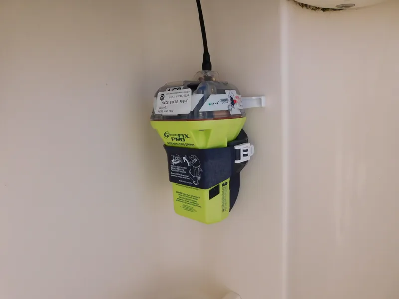 Slide: The Image of Emergency beacon on 2018 Grady-White Freedom 375 boat. - 26