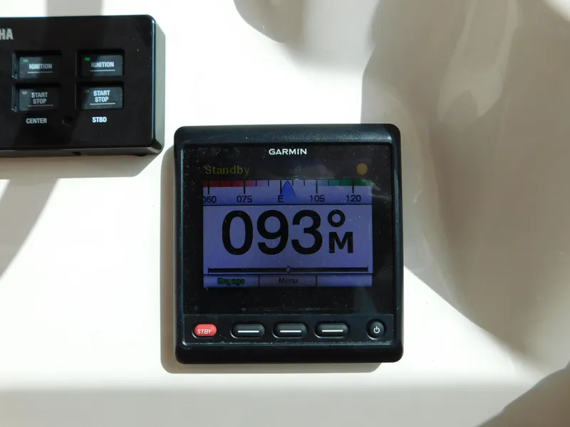 Slide: The Image of Garmin marine display on 2018 Grady-White Freedom 375 boat dashboard. - 37