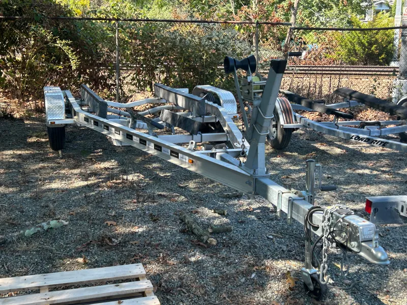 Slide: The Image of 2021 Seaway 21 Seafarer Cuddy boat trailer in outdoor storage. - 14