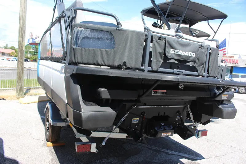 Slide: The Image of 2023 Sea-Doo Switch Sport 18 - 230 HP rear view on trailer. - 12