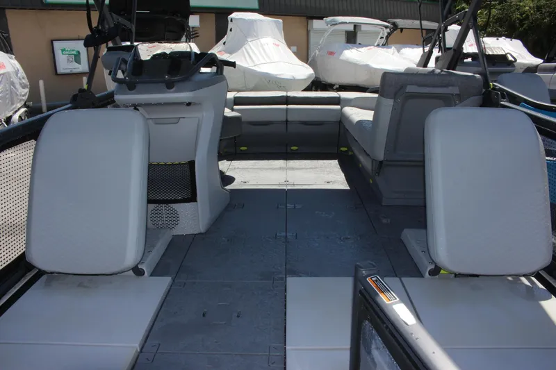 Slide: The Image of 2023 Sea-Doo Switch Sport 18 - 230 HP interior with seating and control console. - 15