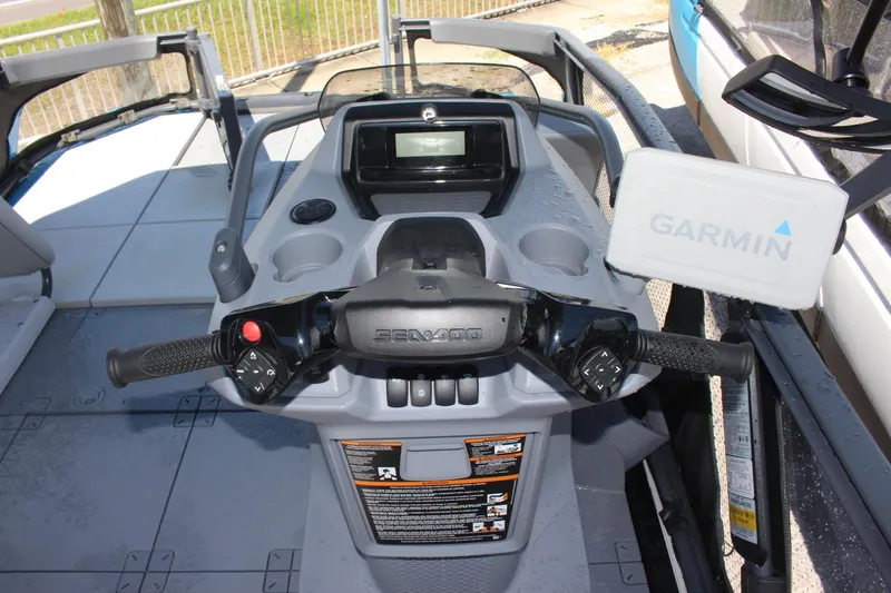 Slide: The Image of 2023 Sea-Doo Switch Sport 18 - 230 HP dashboard with Garmin navigation system. - 17