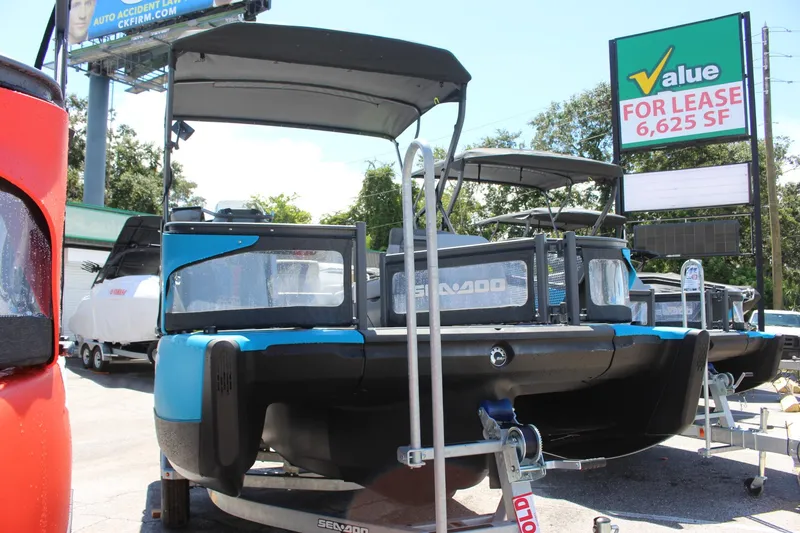 Slide: The Image of 2023 Sea-Doo Switch Sport 18 - 230 HP on trailer, outdoor display. - 20