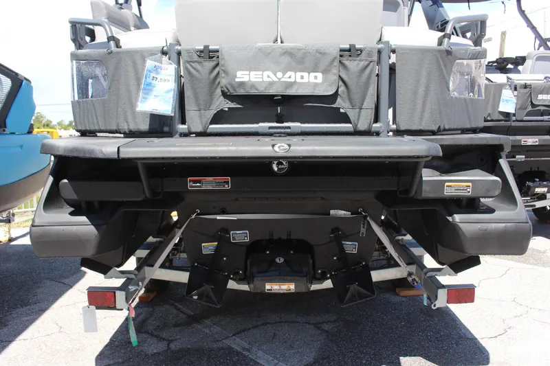 Slide: The Image of 2023 Sea-Doo Switch Sport 18 - 230 HP rear view, showcasing the boat's design and features. - 3