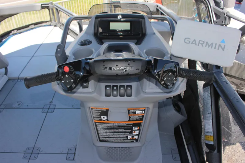 Slide: The Image of 2023 Sea-Doo Switch Sport 18 - 230 HP dashboard with Garmin navigation system. - 7