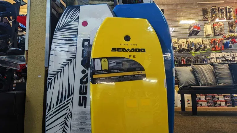 Slide: The Image of Sea-Doo Switch Sport 21 - 230 HP 2023 model on display in a store. - 10