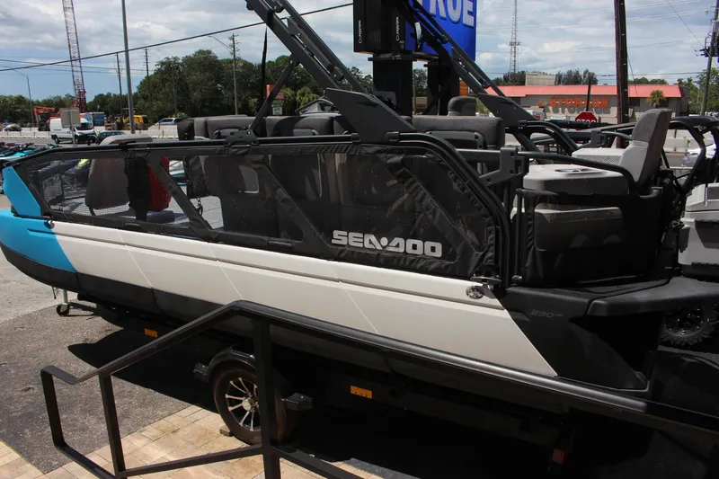 Slide: The Image of 2023 Sea-Doo Switch Sport 21 - 230 HP on trailer, side view. - 2