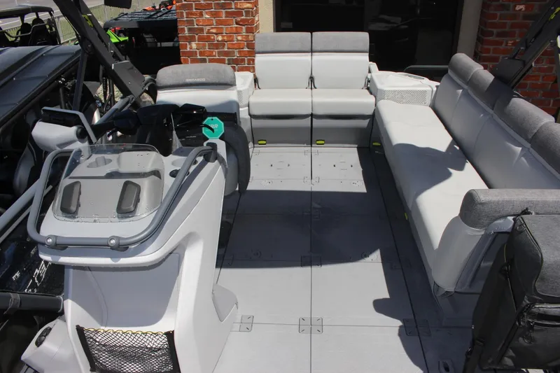 Slide: The Image of 2023 Sea-Doo Switch Sport 21 - 230 HP interior with spacious seating and modern controls. - 5